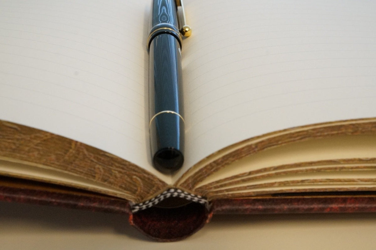 Paperblanks B6 Lined Notebook in Deep Red for Creative Writing